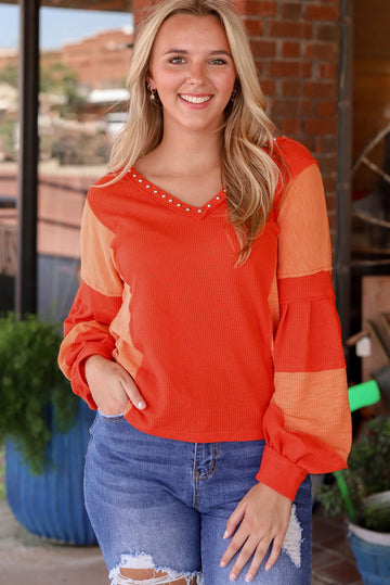 Fiery Red Studded V Neckline Exposed Seam Textured Knit Top eAura