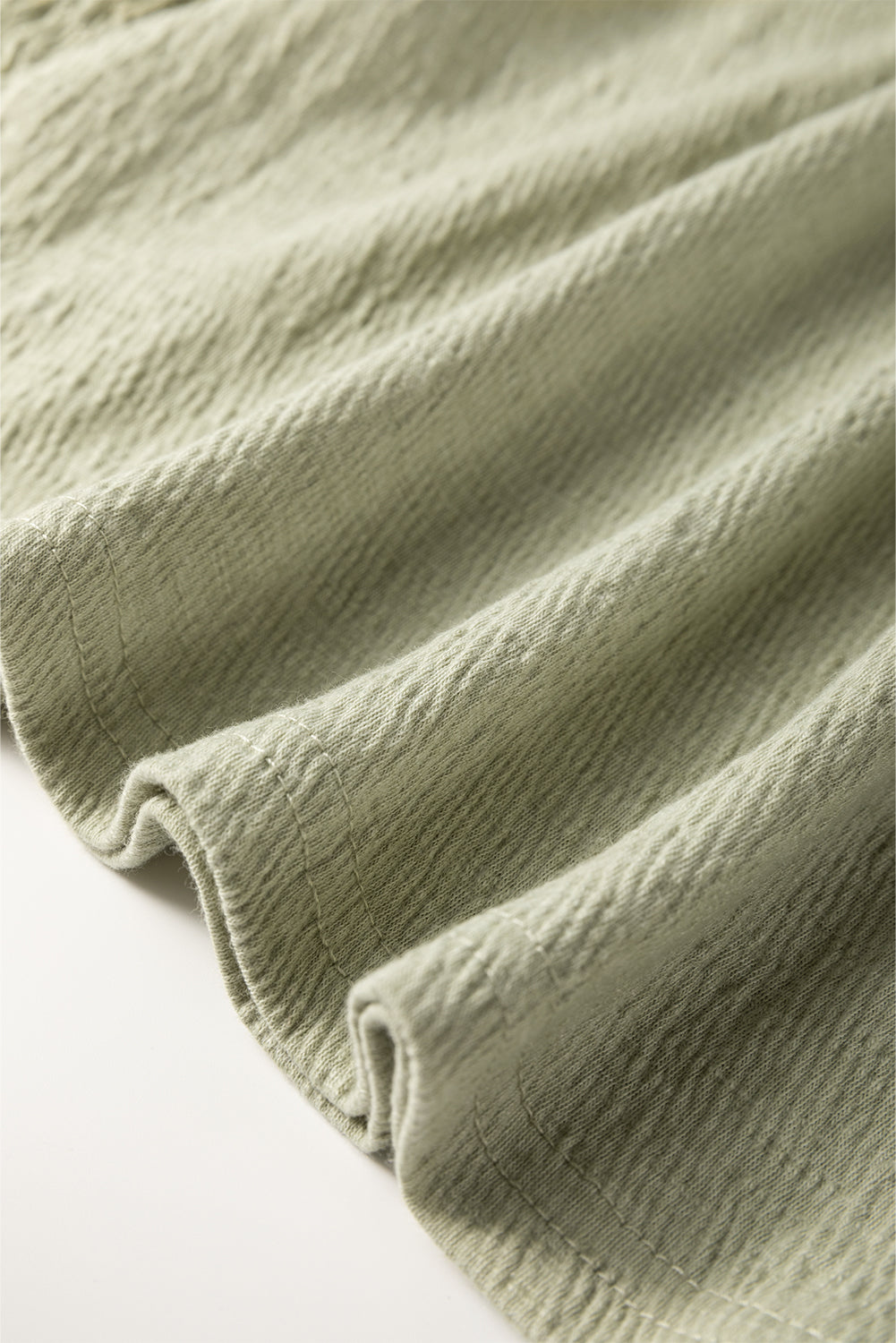 Laurel Green Textured Round Neck Half Sleeve Blouse eAura