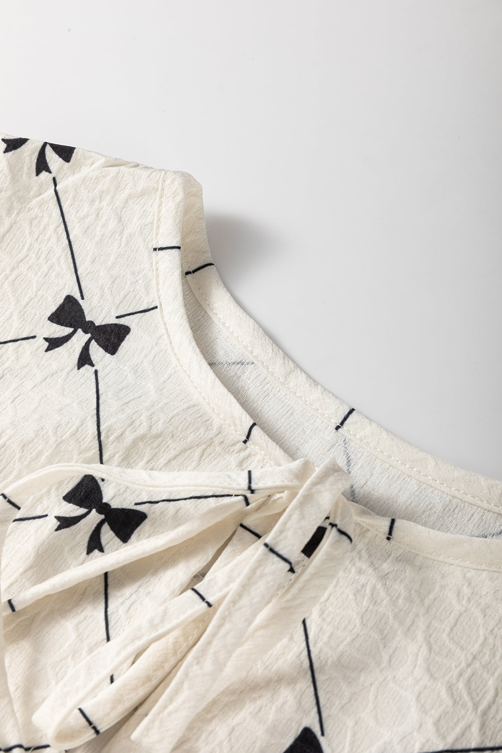 White Bowtie Pattern Textured Puff Half Sleeve Loose Mini Dress eAura