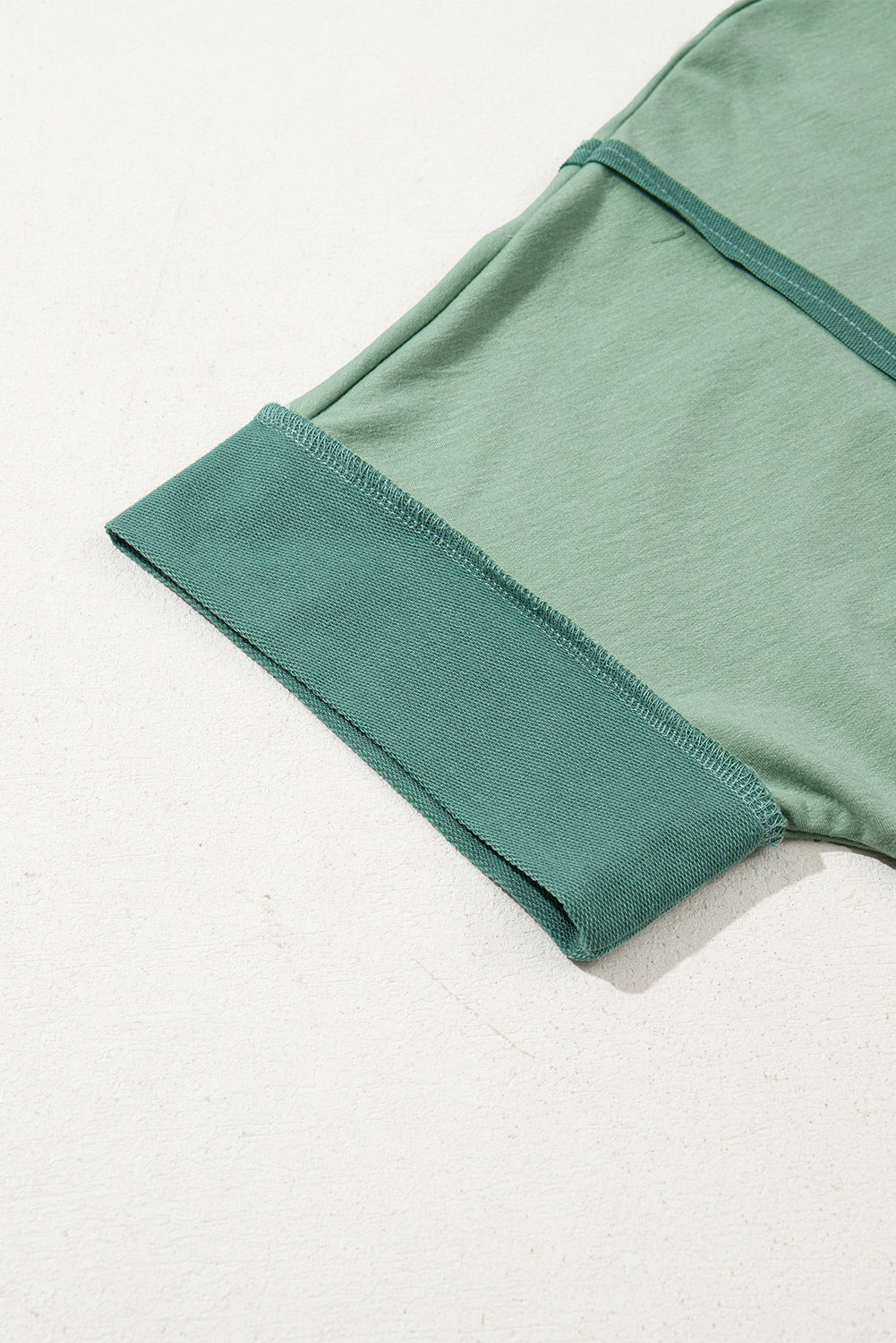 Green Half Sleeve Raw Seam High Low Side Split Top eAura
