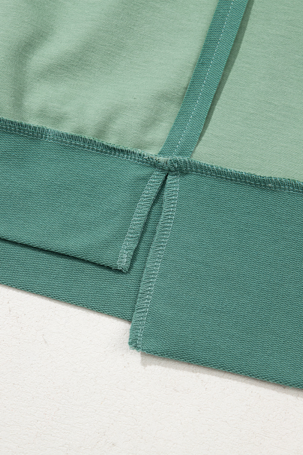 Green Half Sleeve Raw Seam High Low Side Split Top eAura