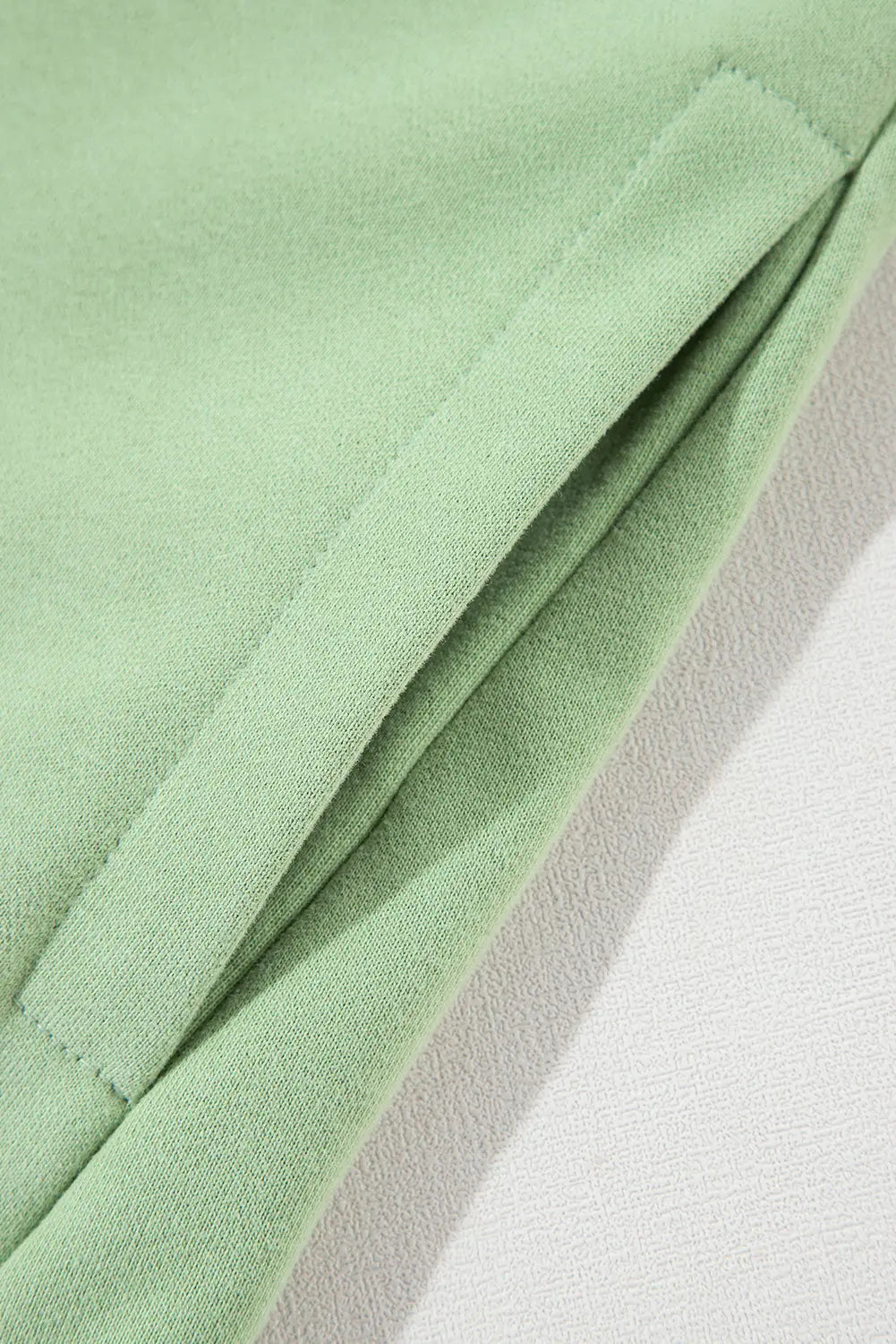 Bonbon Solid Fleece Lined Drop Shoulder High Low Sweatshirt Beagle Boutique Fashion Outlet
