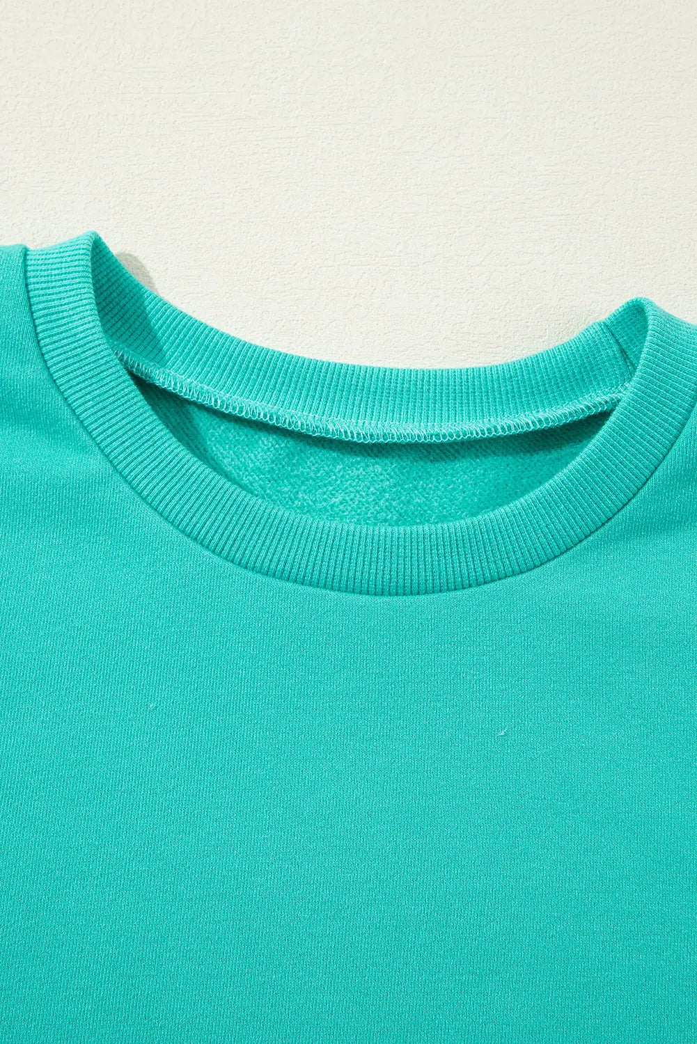 Bonbon Solid Fleece Lined Drop Shoulder High Low Sweatshirt Beagle Boutique Fashion Outlet