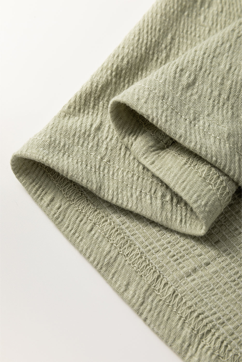 Laurel Green Textured Round Neck Half Sleeve Blouse eAura