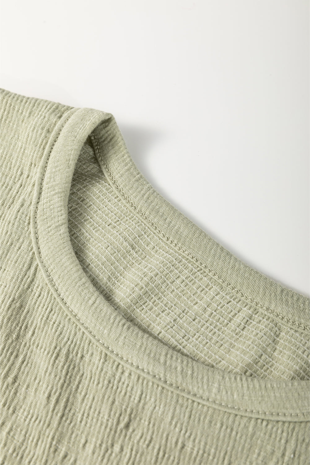 Laurel Green Textured Round Neck Half Sleeve Blouse eAura