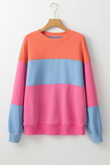 Women's light blue block colour sweater folded neatly — knitwear care guide at eAura