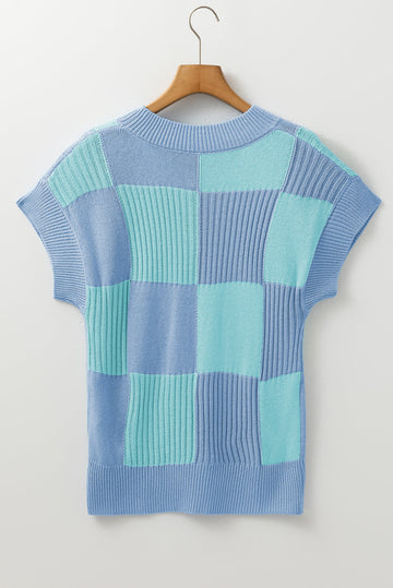Light blue checkered colour block crew neck short sleeve sweater styled as a casual women's outfit, from eAura