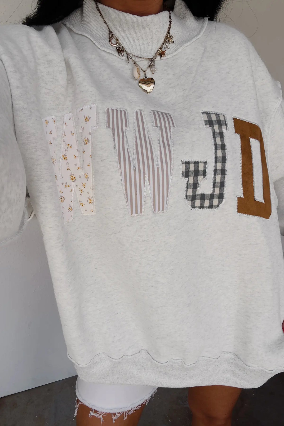 WWJD Mixed Pattern Embroidered Patch Graphic Mock Neck Sweatshirt – Grey