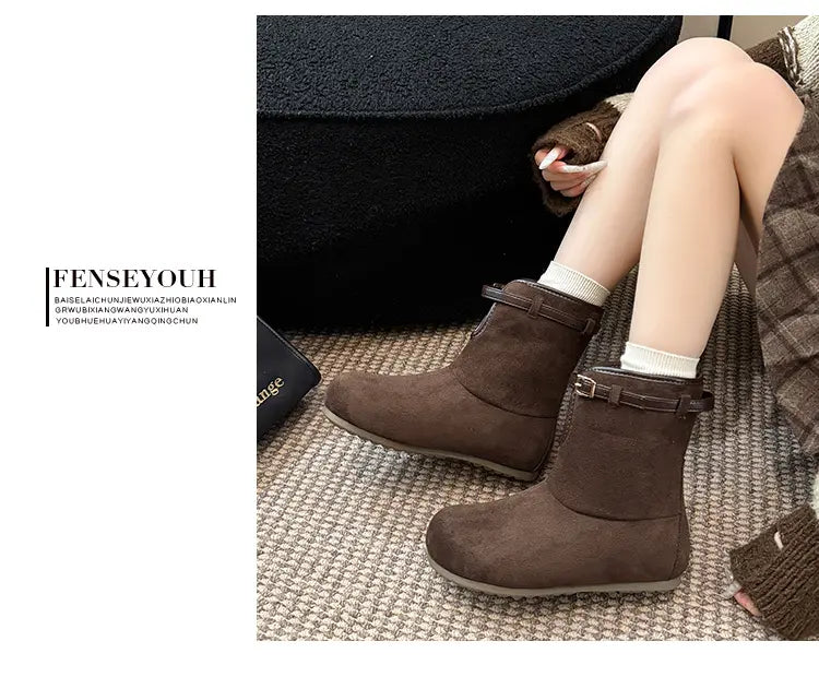 Brown ankle boots worn with socks