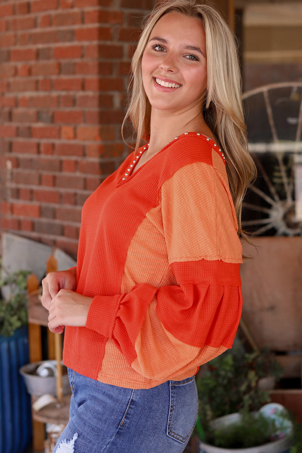 Fiery Red Studded V Neckline Exposed Seam Textured Knit Top eAura