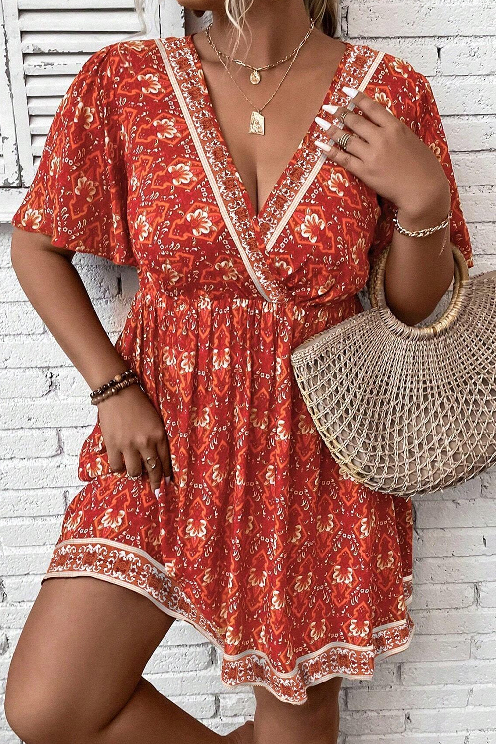 Orange Plus Size Printed Surplice Neck Empire Waist Flowy Mini Dress BB Fashion Outlet