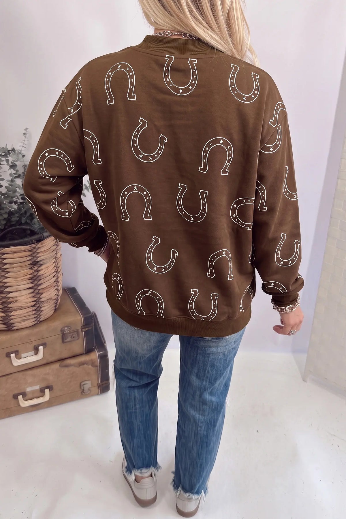 Mock neck pullover sweatshirt with western horseshoe print