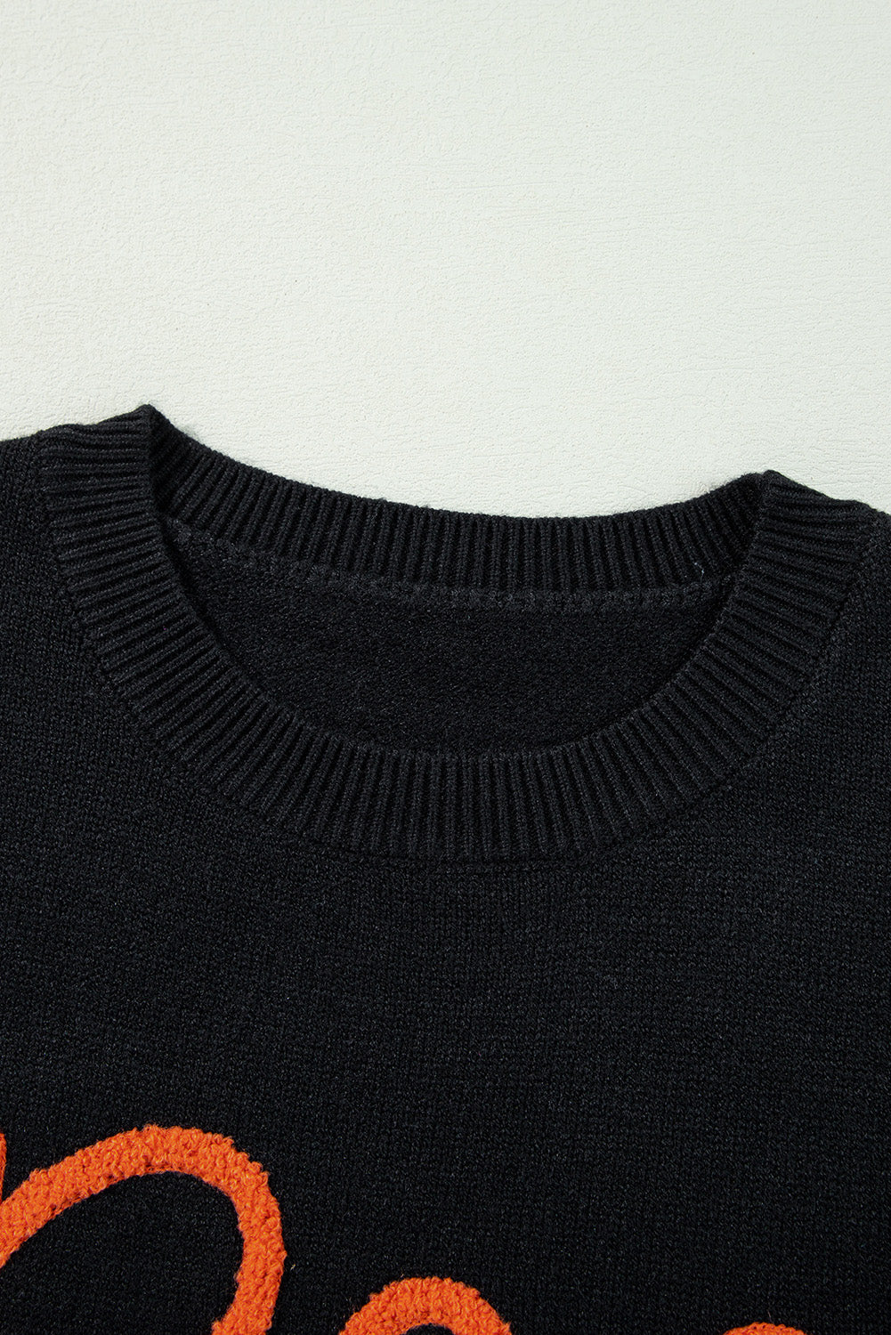Black Boo Knitted Pattern Ribbed Edge Drop Shoulder Sweater eAura