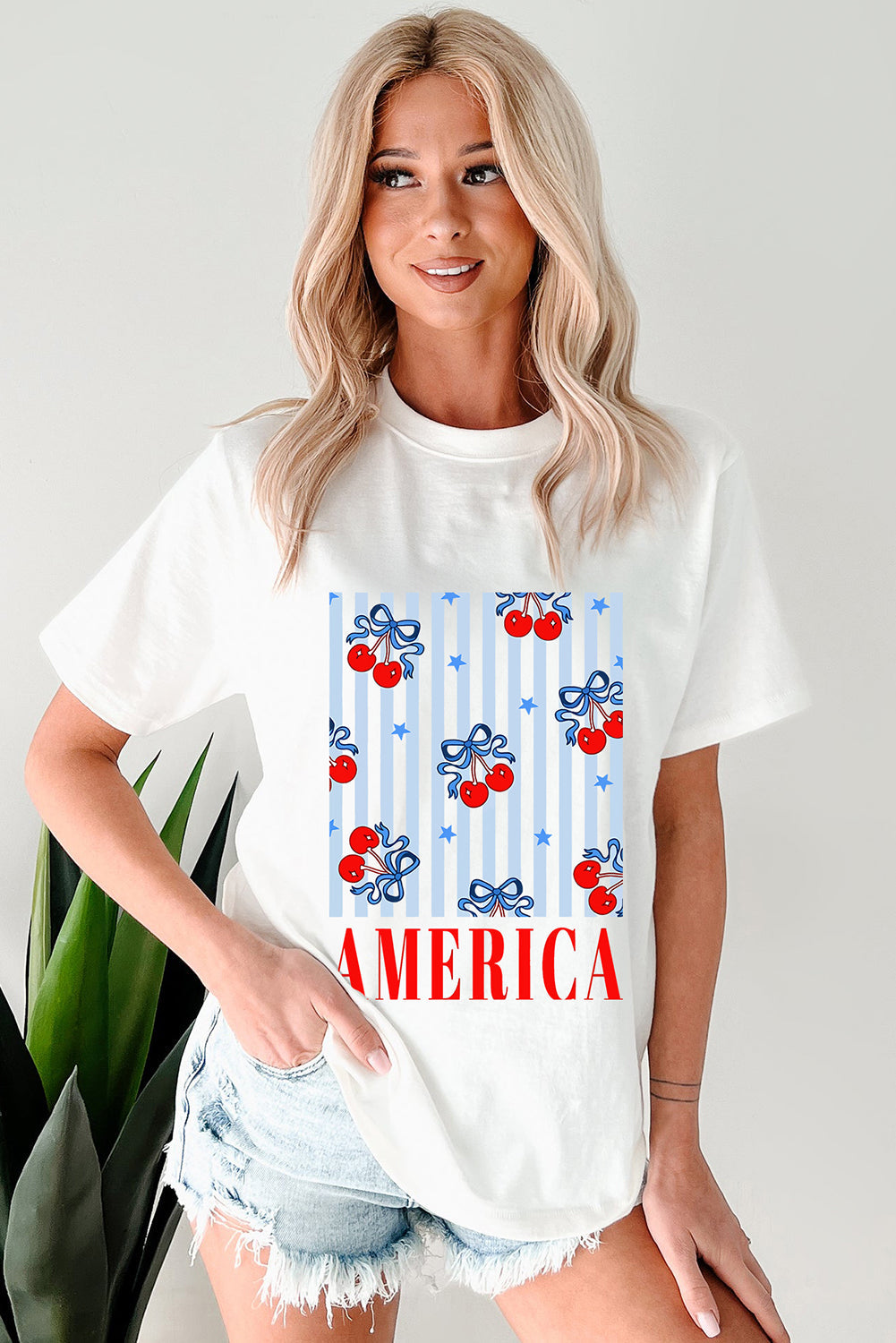 White Bow Cherry AMERICA Graphic Crewneck T Shirt eAura