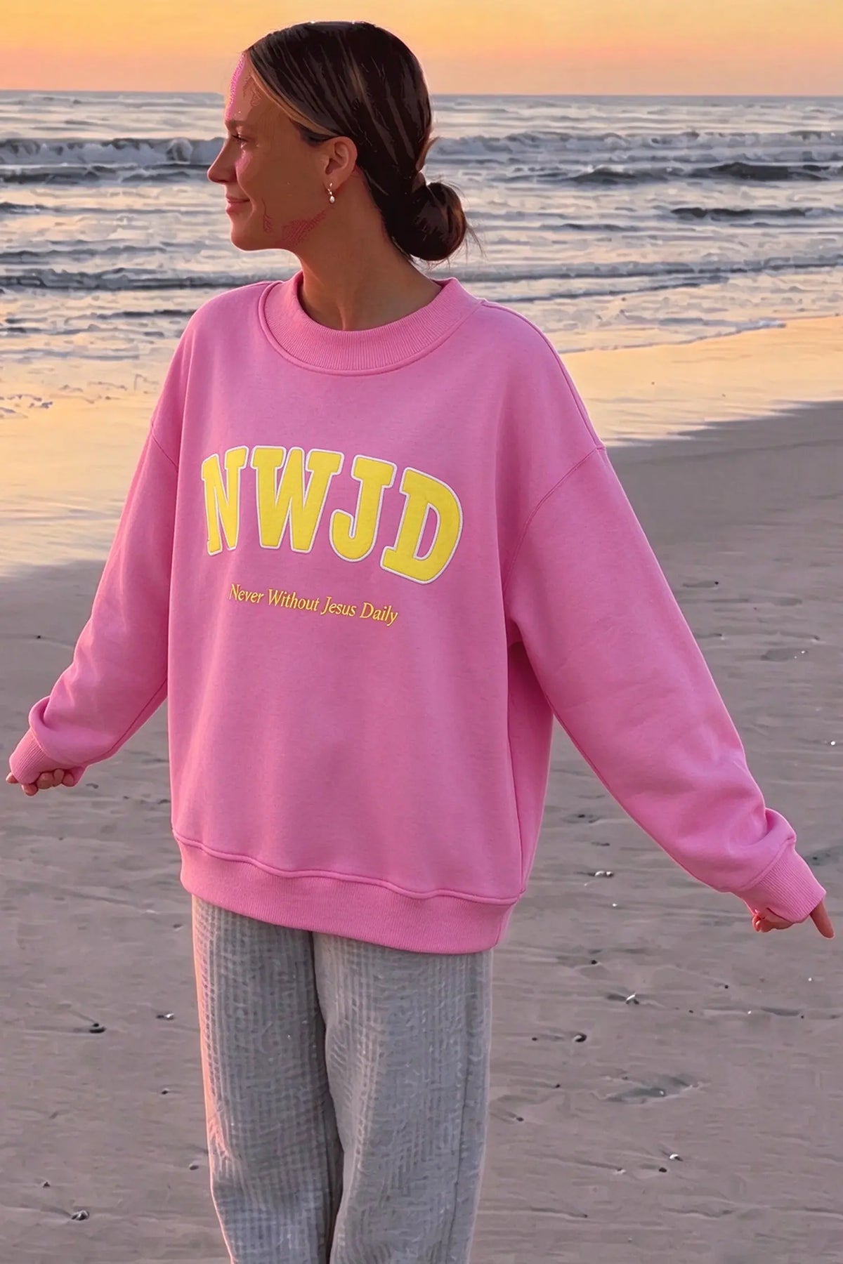 WWJD embroidered long-sleeve sweatshirt with ribbed neckline, cuffs and hem
