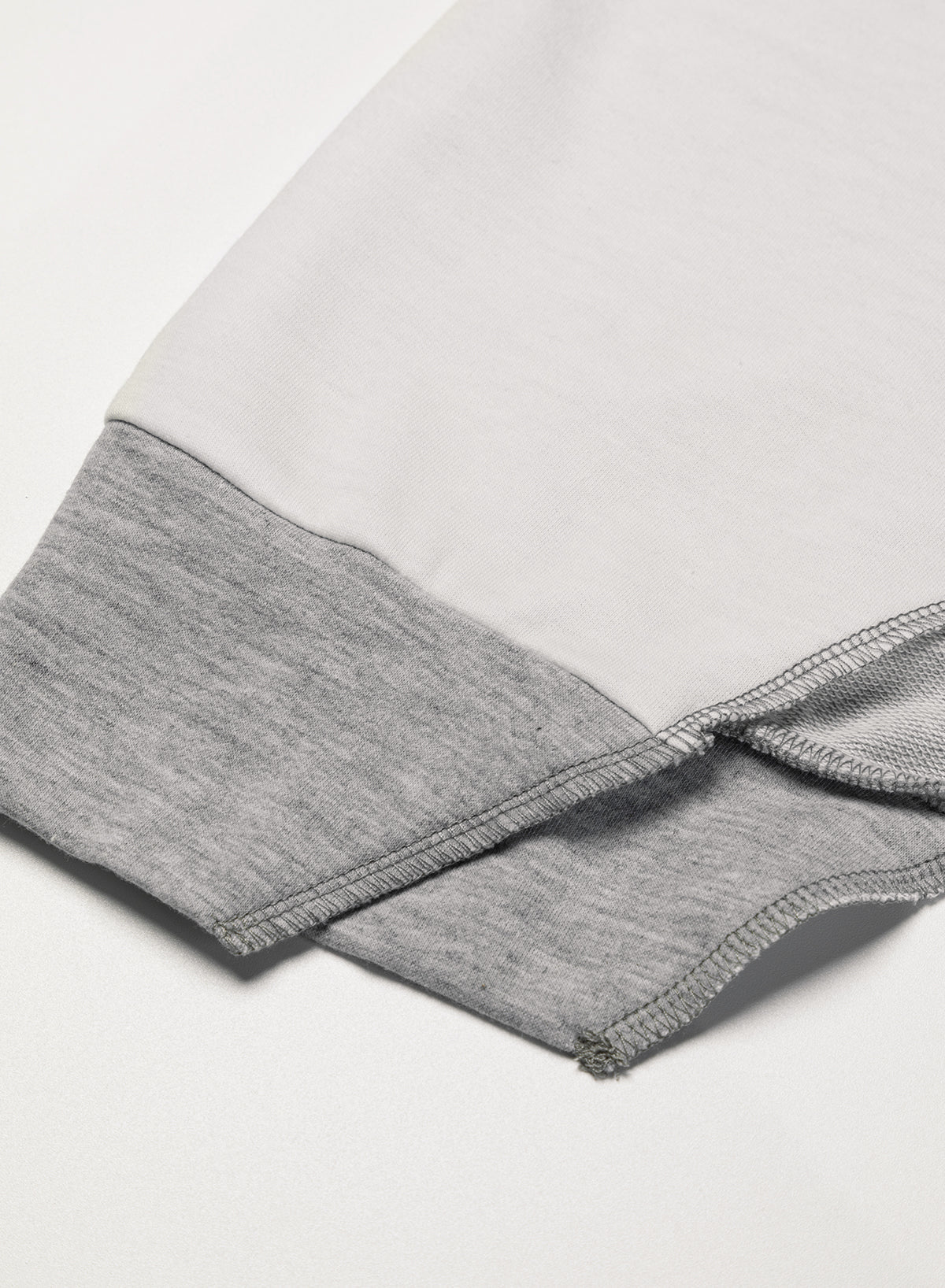 Colour-block Stitching Irregular Hem Long Sleeve Top - eAura