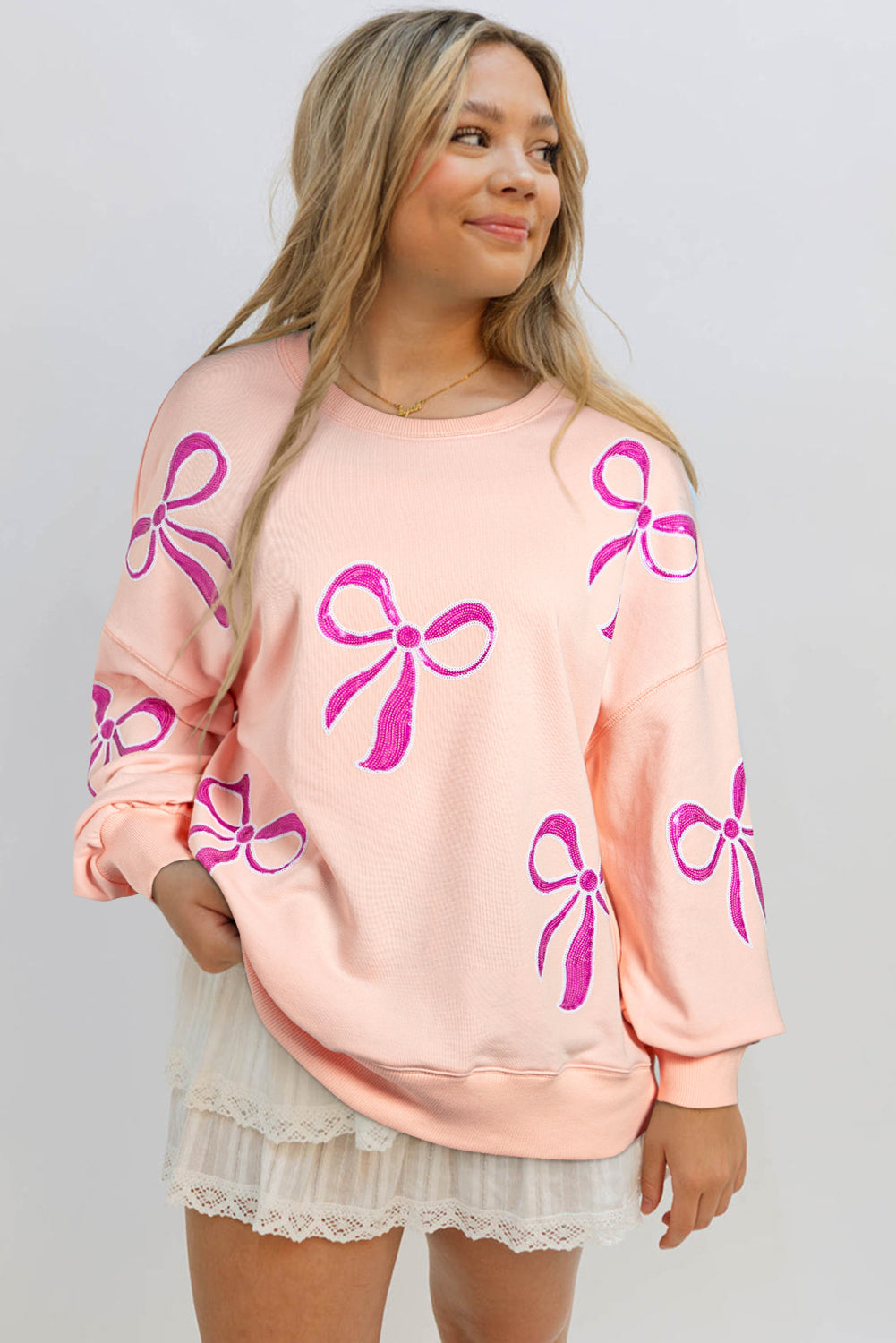 Apricot Pink Sequined Bowknot Drop Shoulder Oversized Sweatshirt eAura