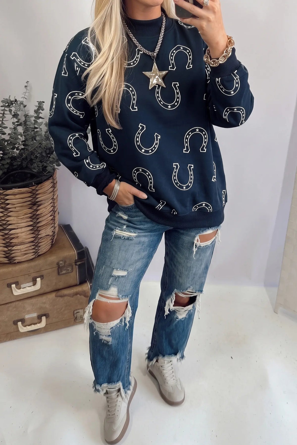 Mock neck pullover sweatshirt with western horseshoe print