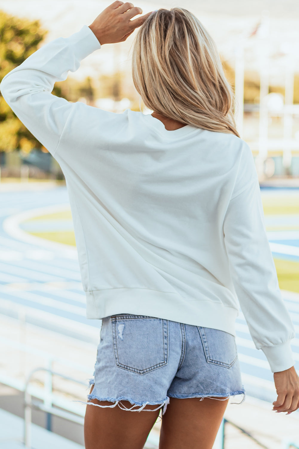 White Tinsel Game Day Drop Shoulder Graphic Sweatshirt eAura