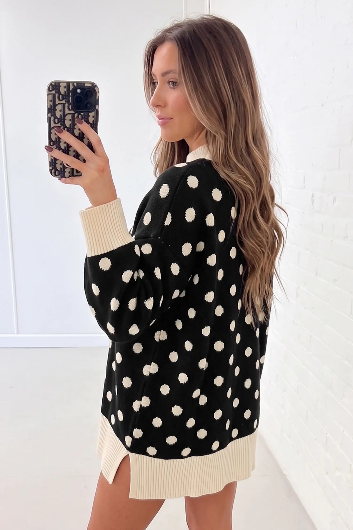 Split tunic sweater with polka dot pattern