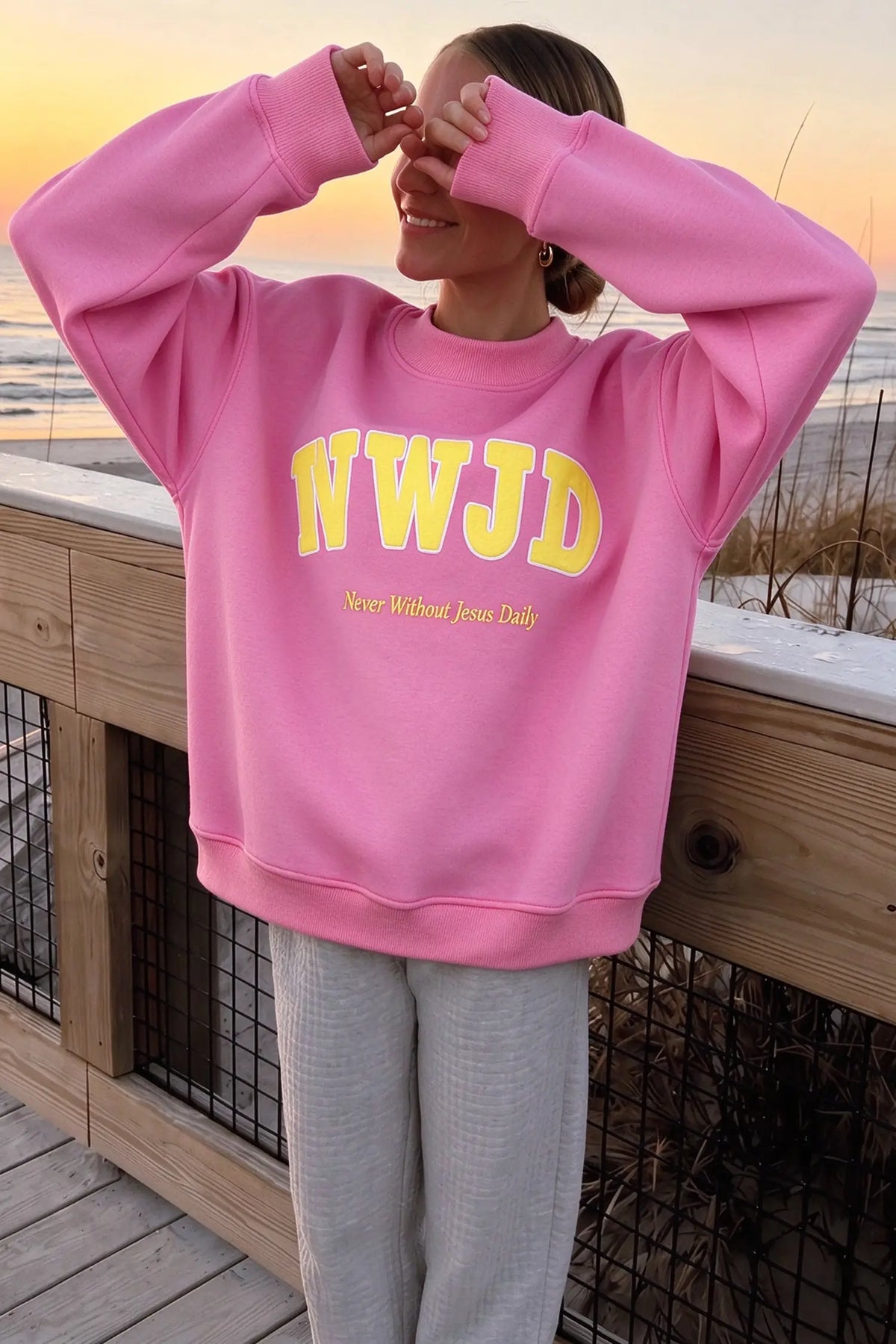 WWJD embroidered long-sleeve sweatshirt with ribbed neckline, cuffs and hem