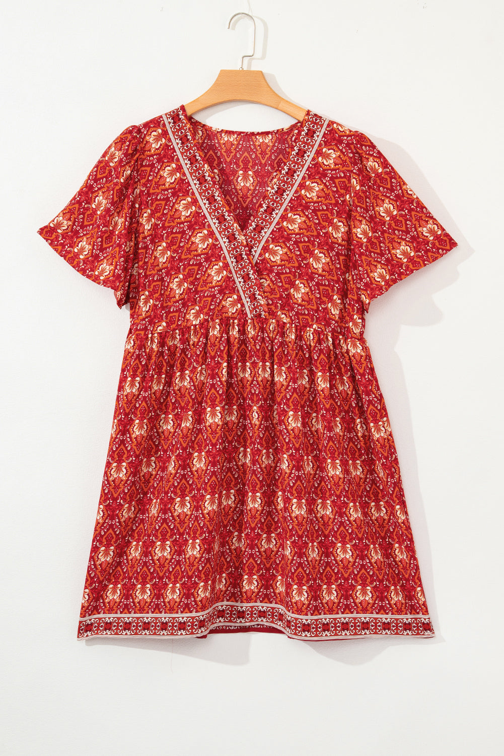 Orange Plus Size Printed Surplice Neck Empire Waist Flowy Mini Dress BB Fashion Outlet