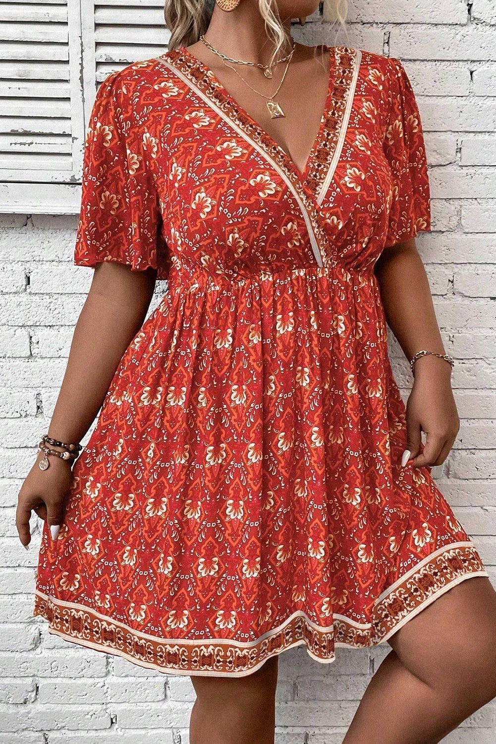Orange Plus Size Printed Surplice Neck Empire Waist Flowy Mini Dress BB Fashion Outlet