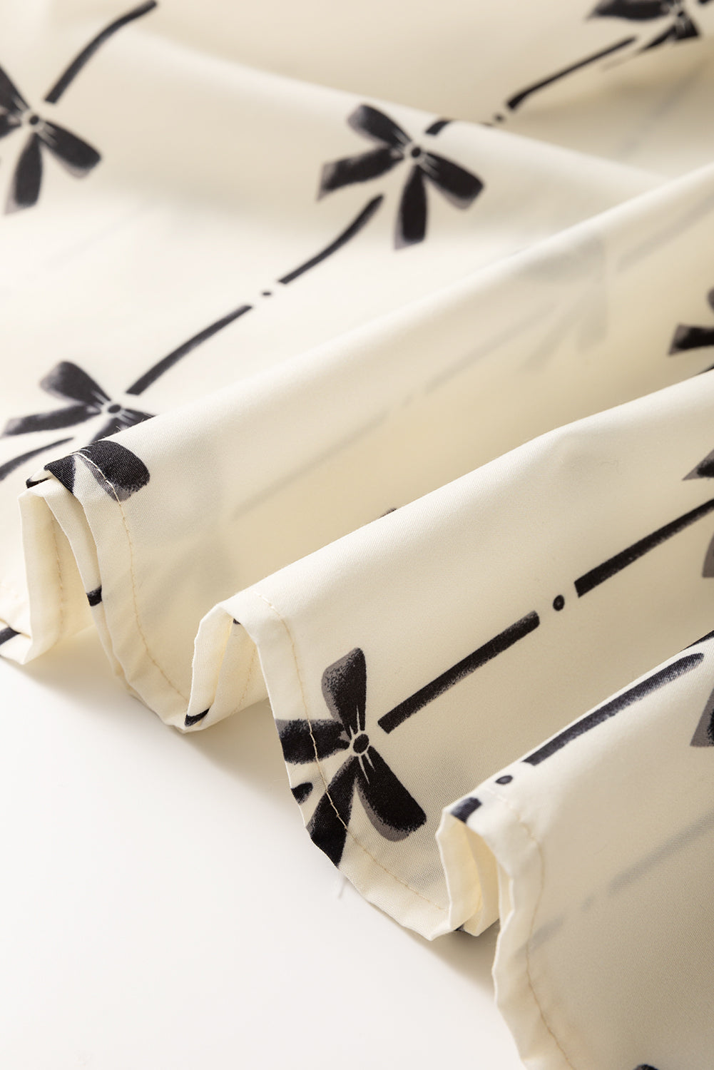 Apricot Bow Printed Ruffled Bubble Sleeve Lace-up Notched Neck Plus Size Blouse - eAura