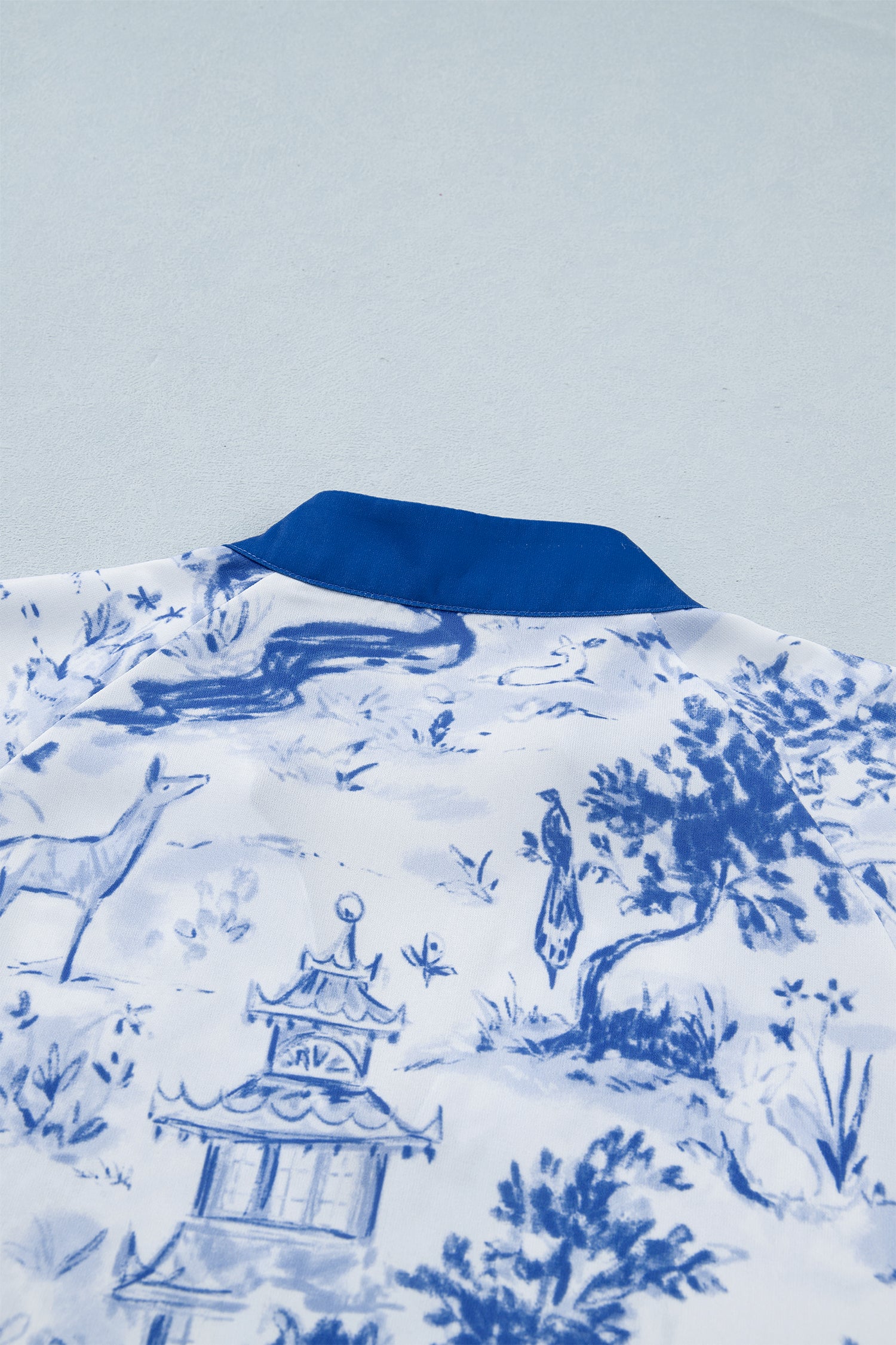 Wild Animal Paradise Contrast V Neck Raglan Sleeve Blouse – Blue