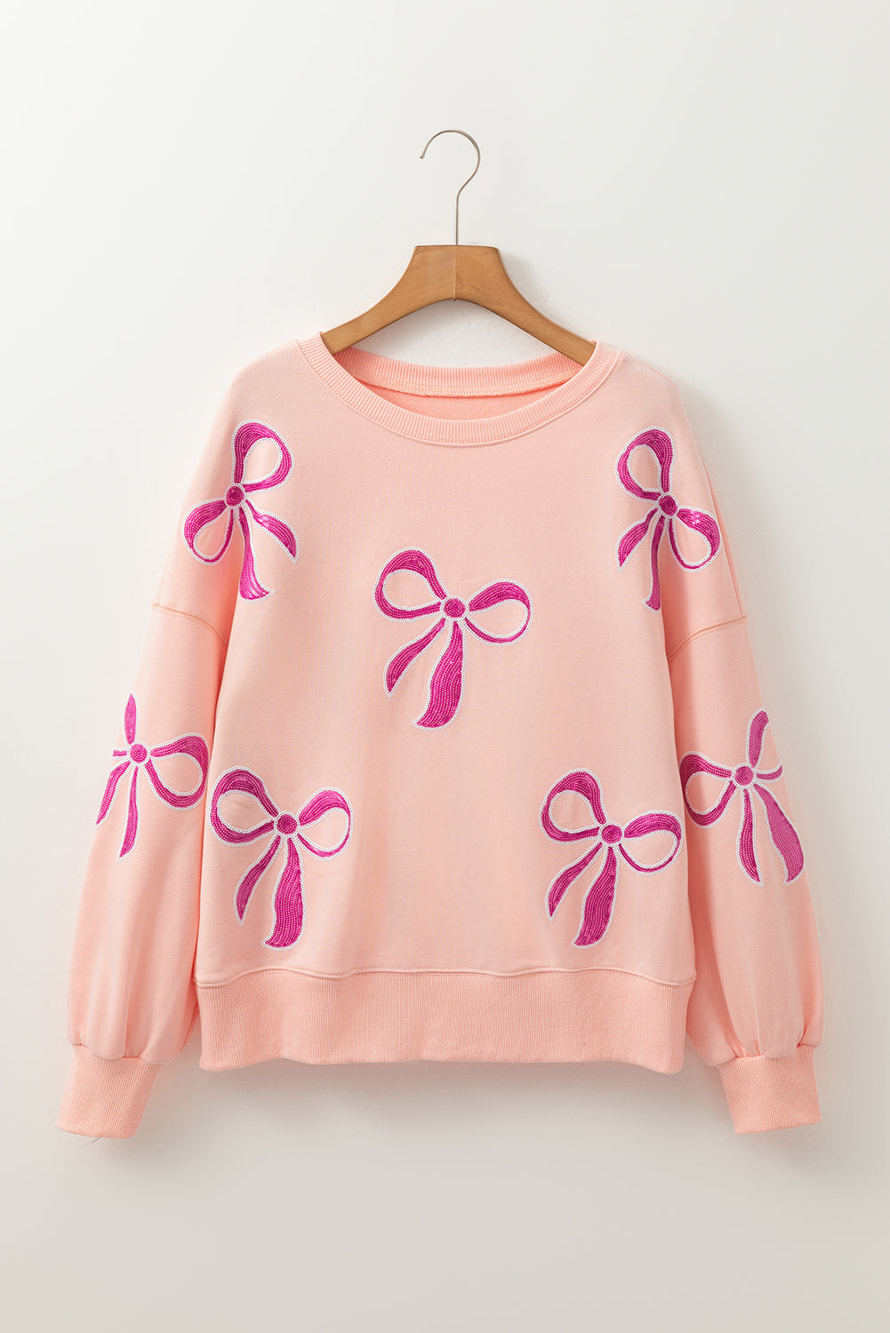 Apricot Pink Sequined Bowknot Drop Shoulder Oversized Sweatshirt eAura