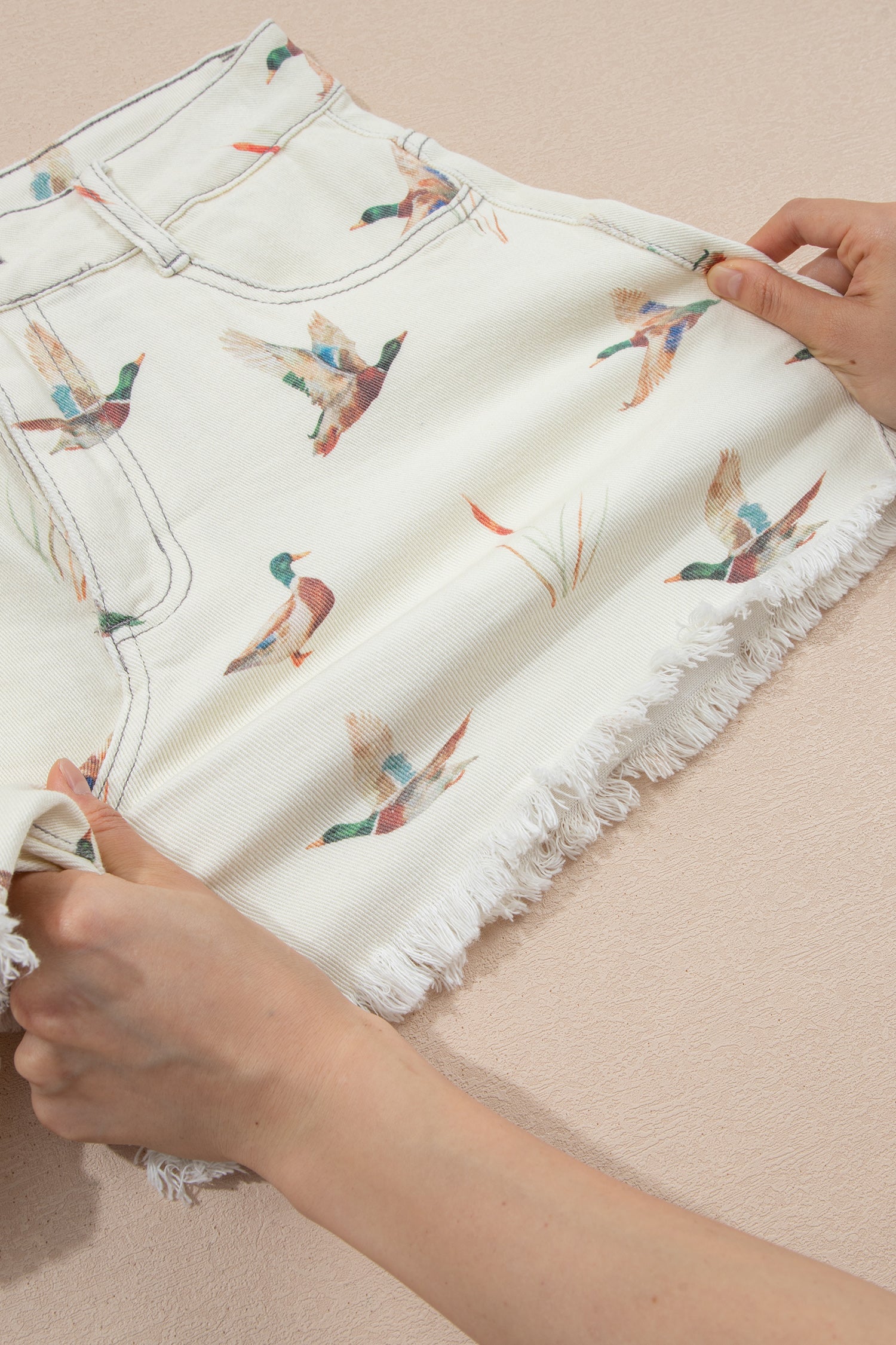 Duck Print High Waist Frayed Hem Denim Shorts – Beige