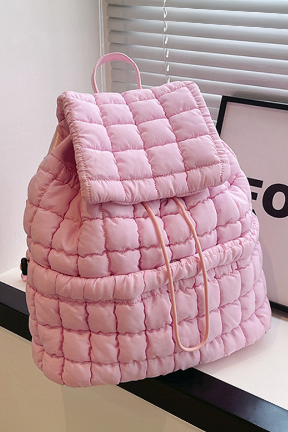 Dusk Blue Solid Flapped Quilted Puffer Backpack