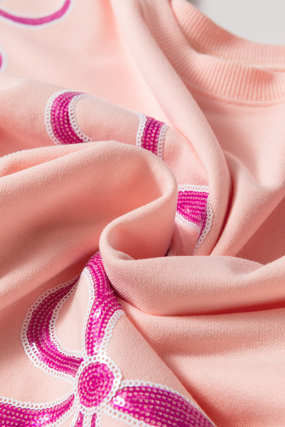 Apricot Pink Sequined Bowknot Drop Shoulder Oversized Sweatshirt eAura