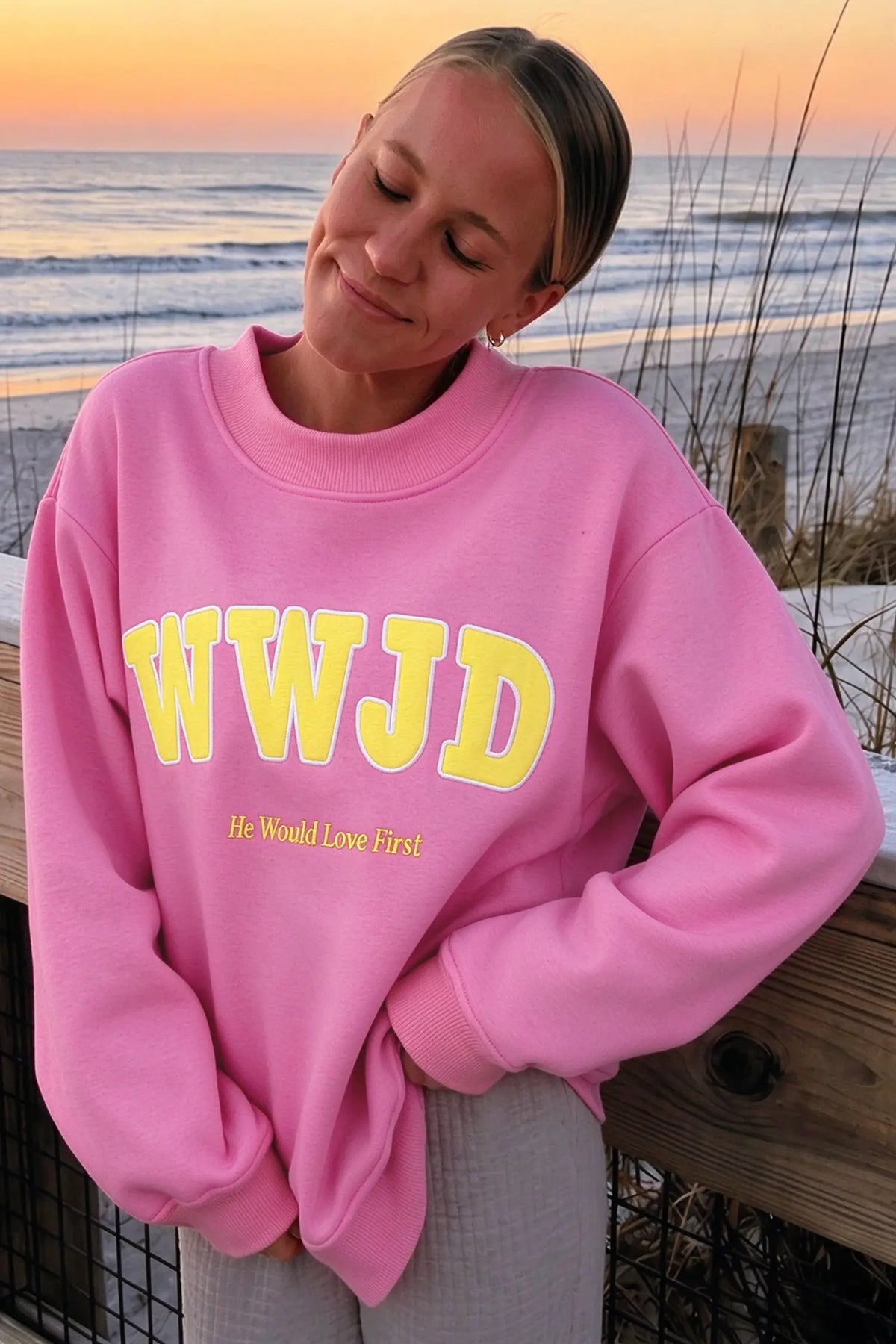WWJD embroidered long-sleeve sweatshirt with ribbed neckline, cuffs and hem