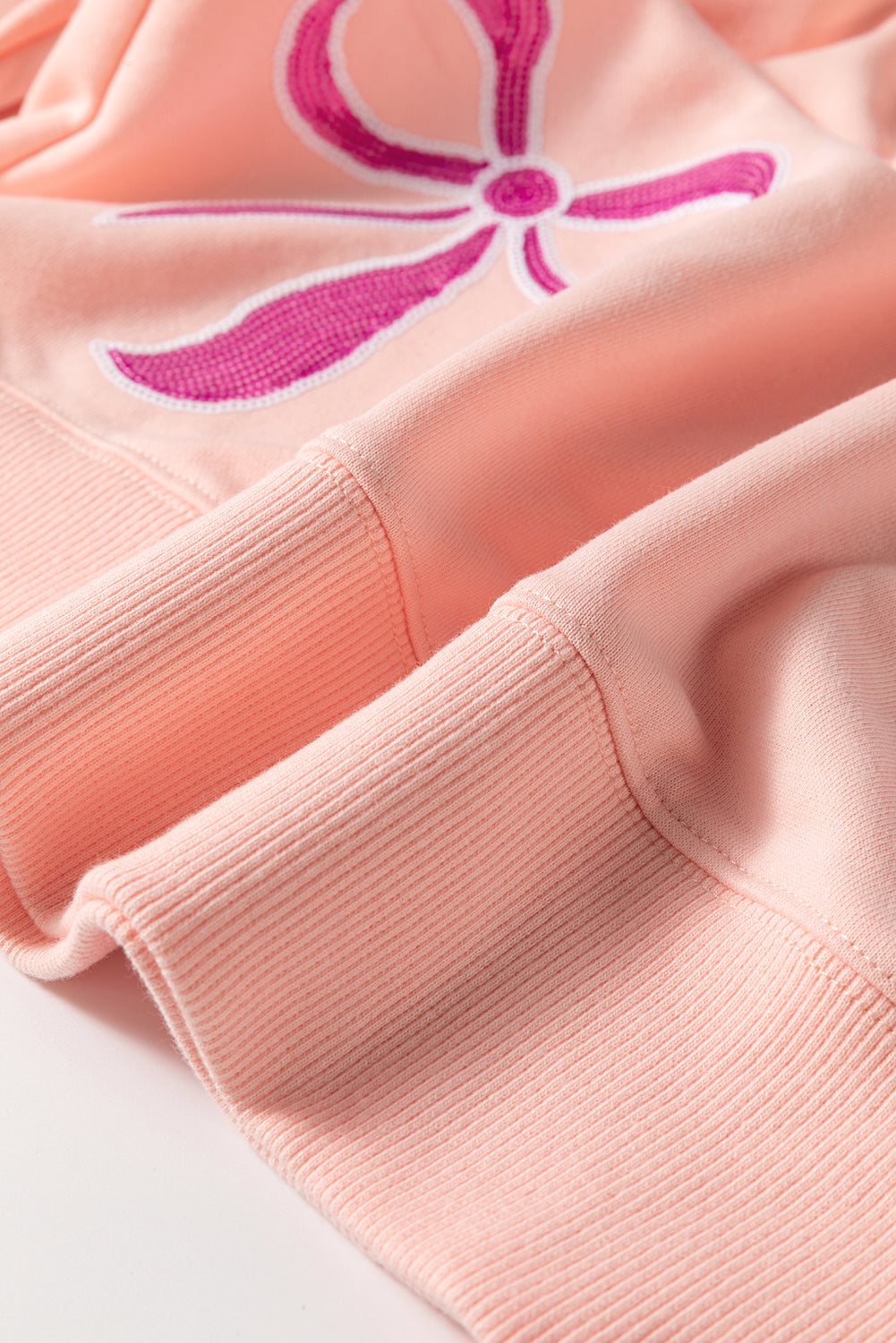 Apricot Pink Sequined Bowknot Drop Shoulder Oversized Sweatshirt eAura