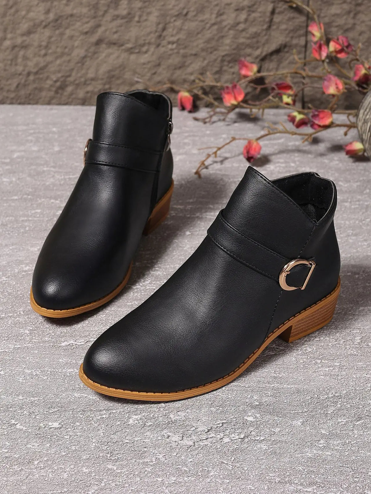 Black ankle boots shown as a pair