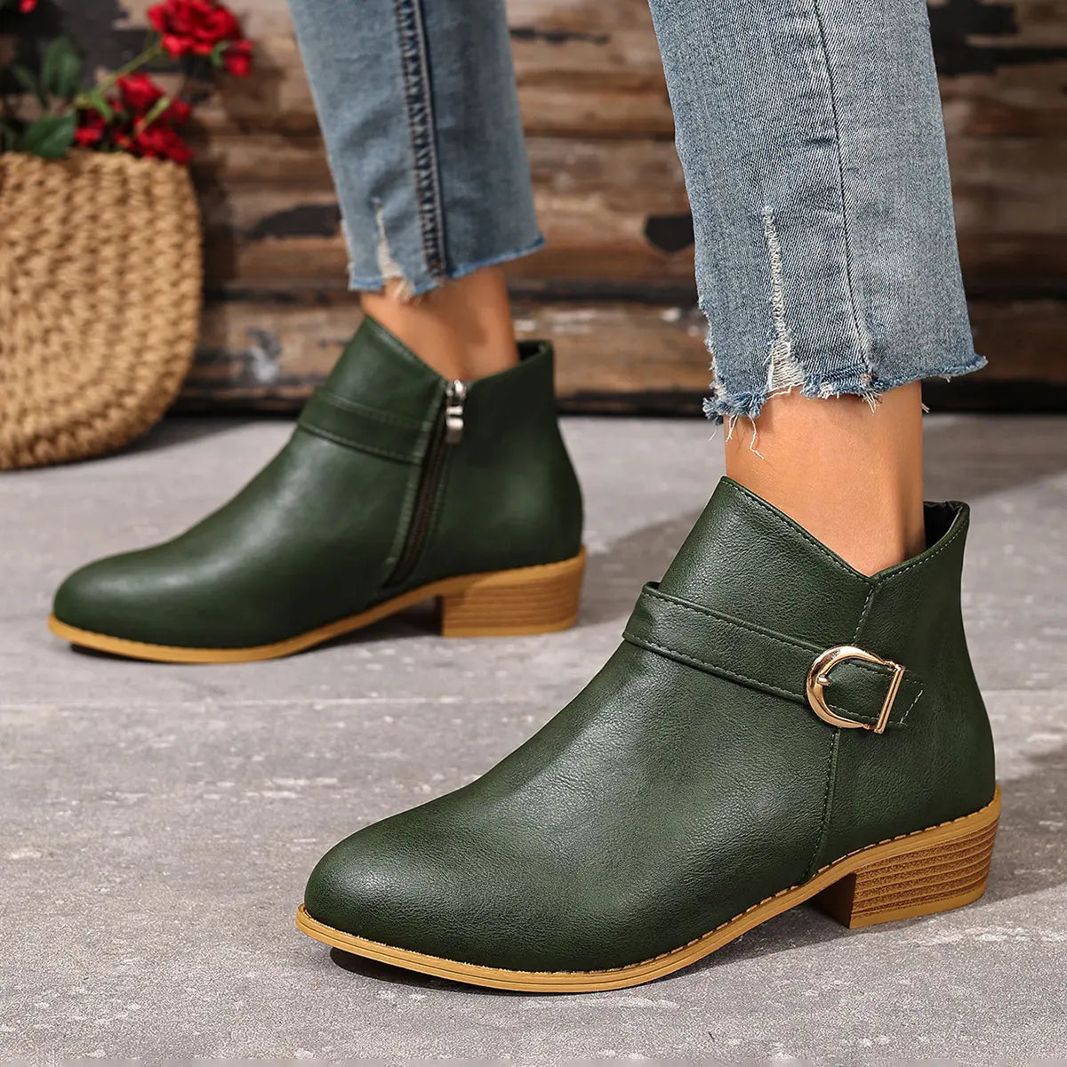 Green boots showing side zip