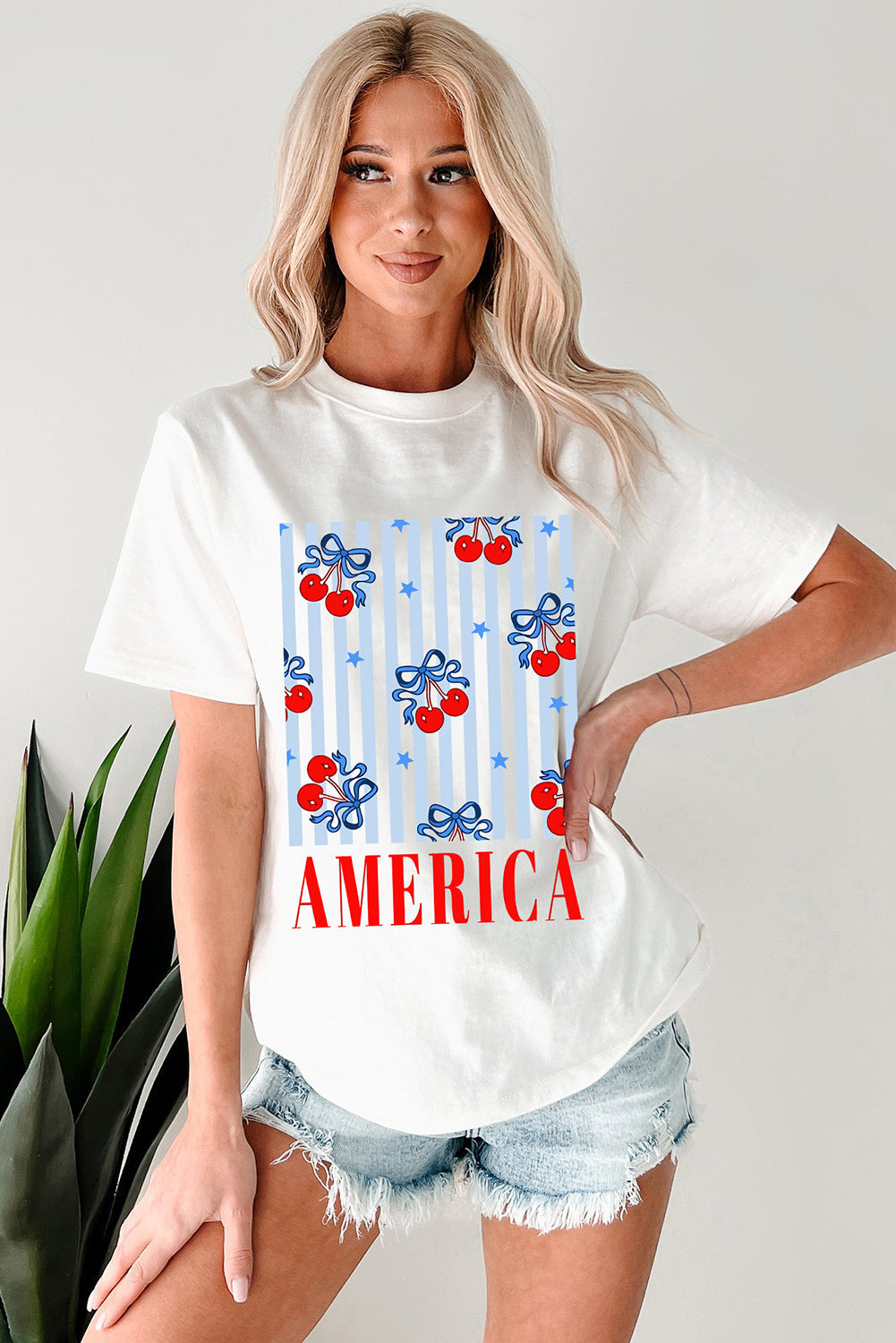 White Bow Cherry AMERICA Graphic Crewneck T Shirt eAura