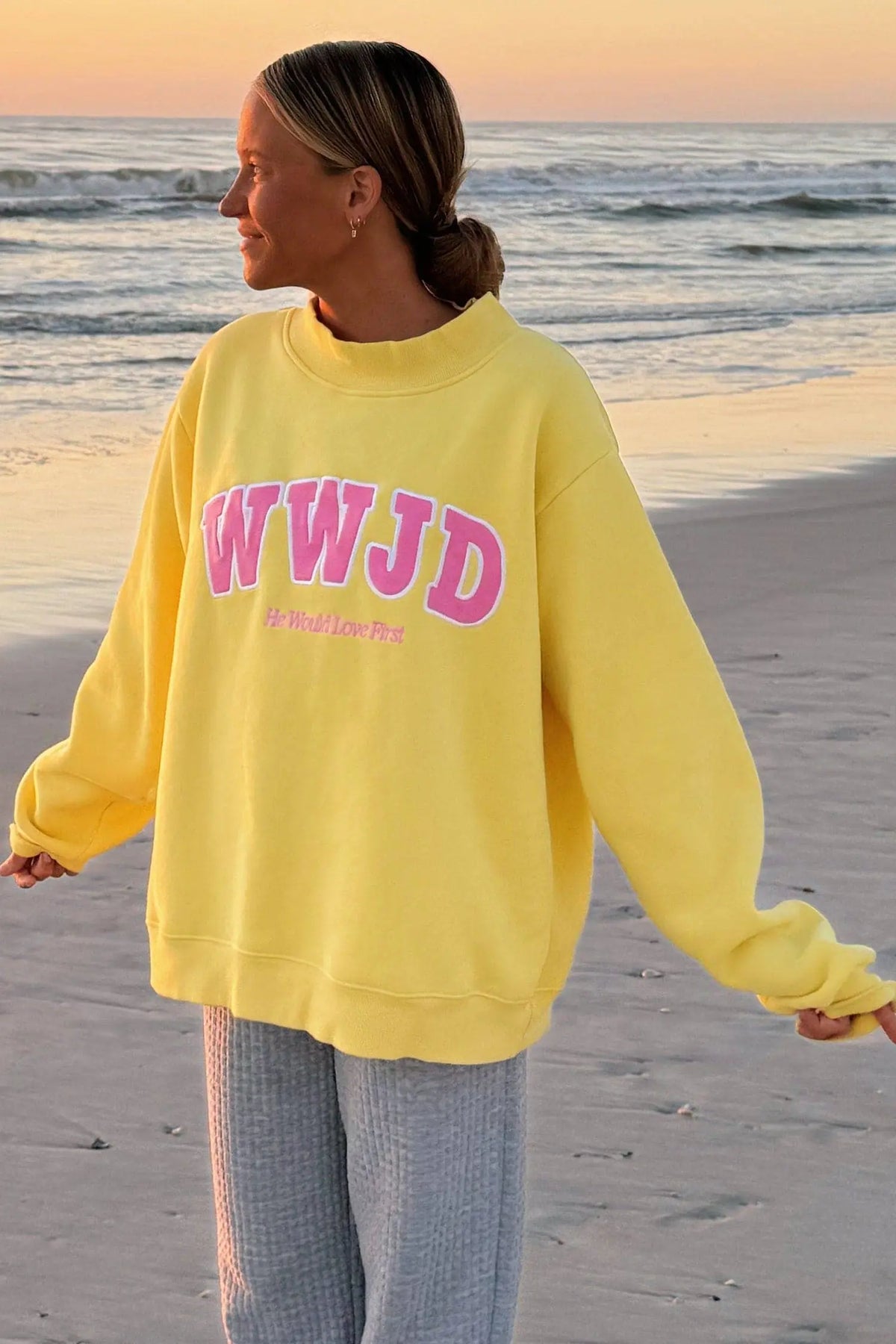 WWJD embroidered long-sleeve sweatshirt with ribbed neckline, cuffs and hem