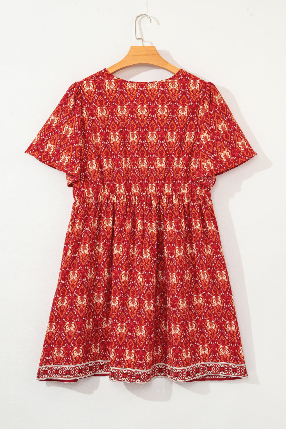 Orange Plus Size Printed Surplice Neck Empire Waist Flowy Mini Dress BB Fashion Outlet