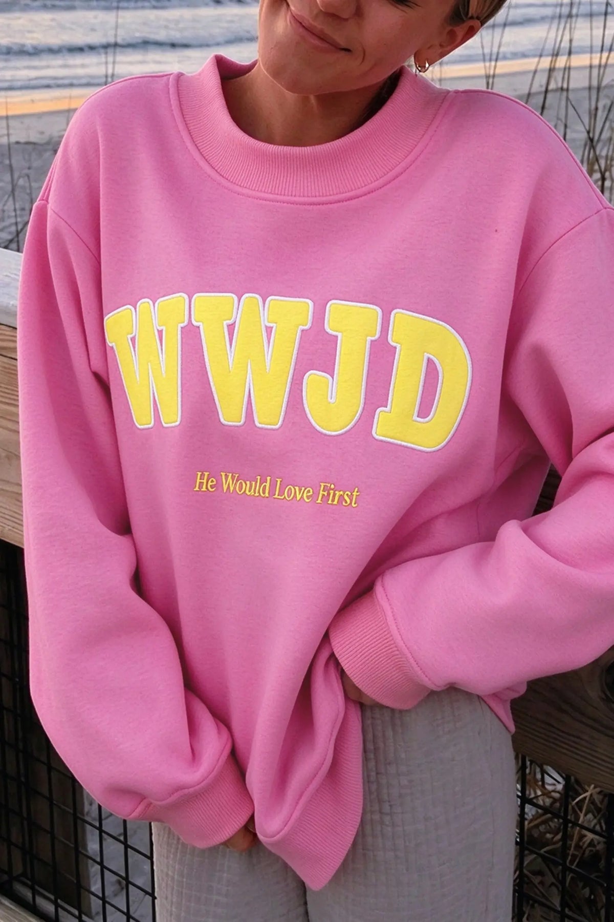 WWJD embroidered long-sleeve sweatshirt with ribbed neckline, cuffs and hem