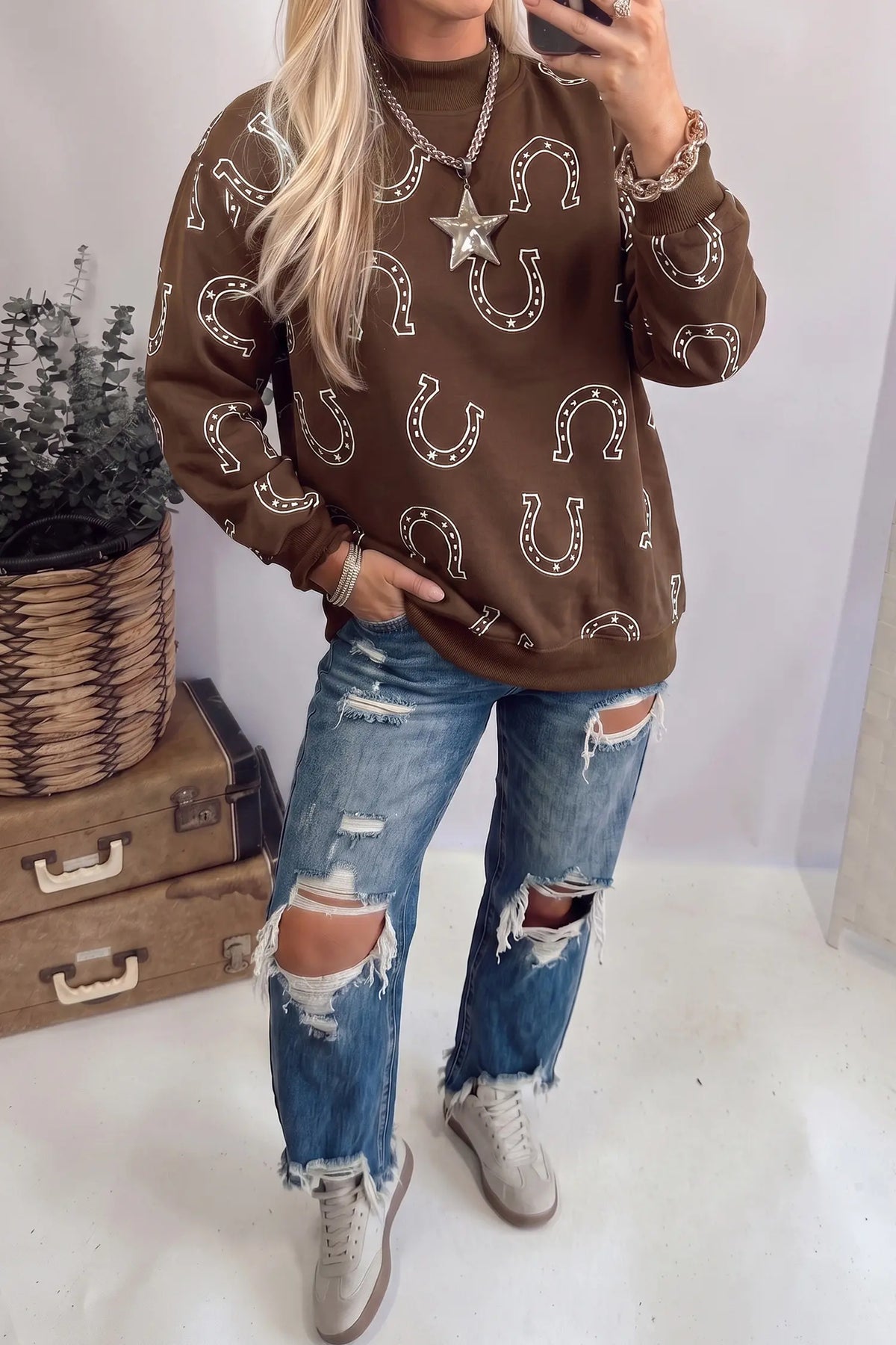 Mock neck pullover sweatshirt with western horseshoe print