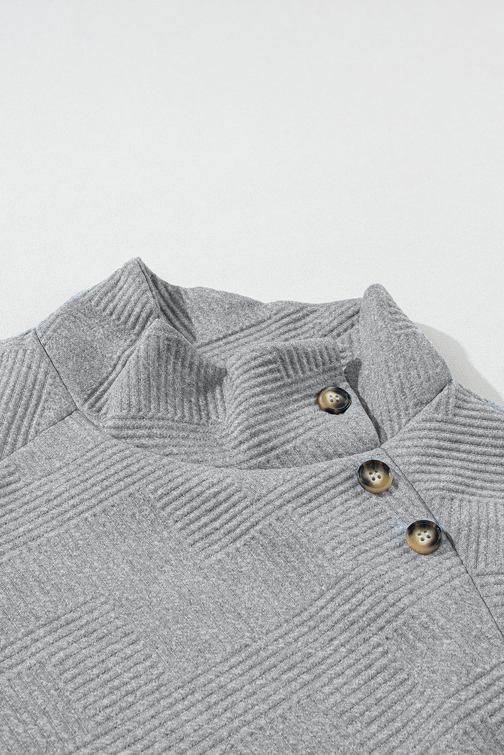Asymmetric Buttons Detail High Neck Textured Sweatshirt eAura