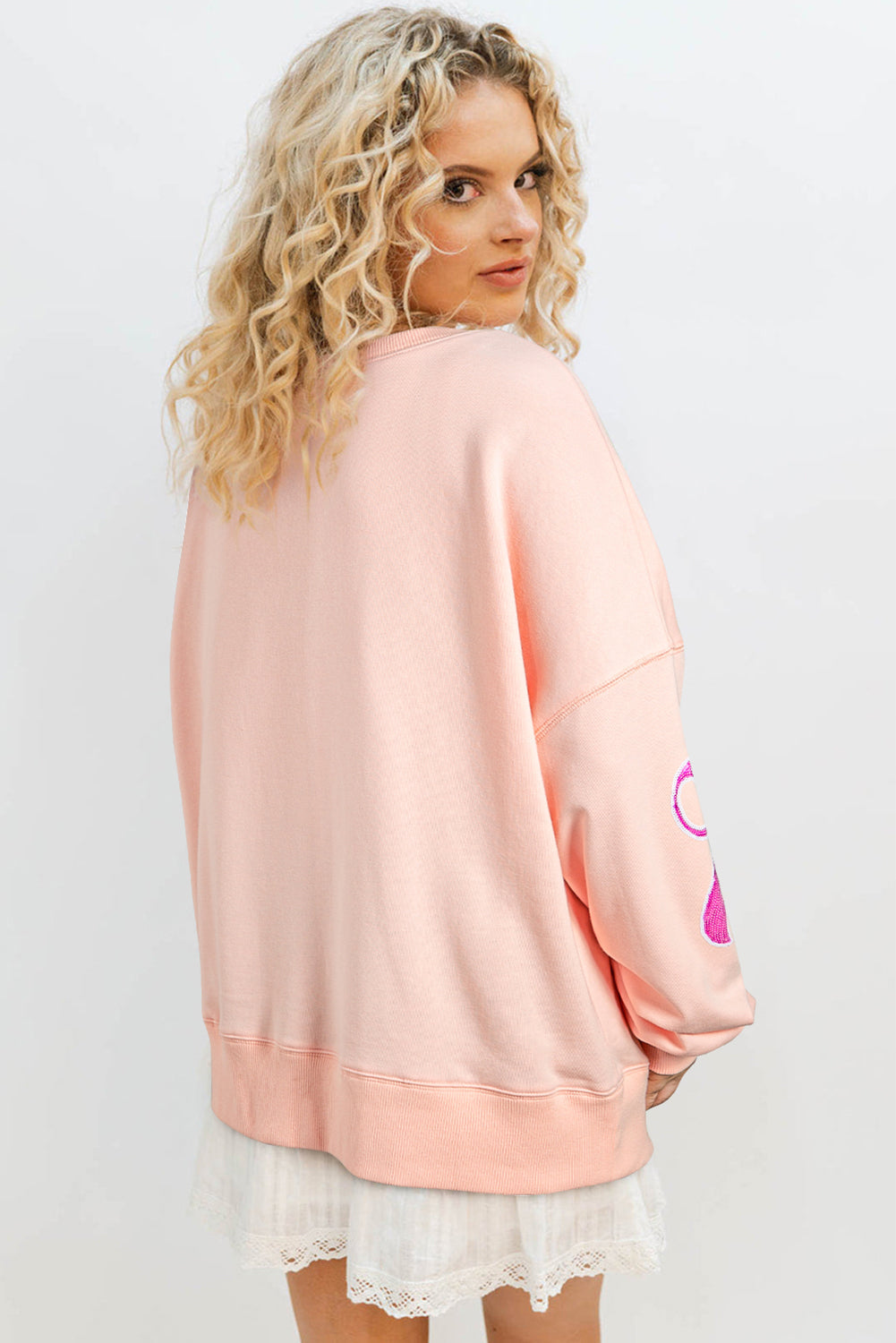 Apricot Pink Sequined Bowknot Drop Shoulder Oversized Sweatshirt - eAura