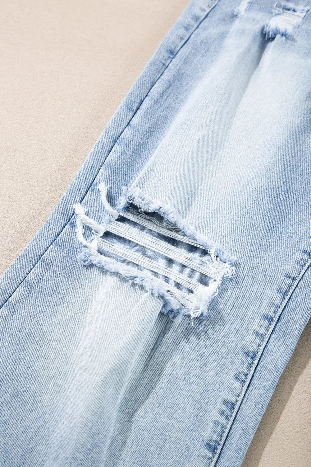 Beau Blue Light Wash Distressed Flare Jeans eAura