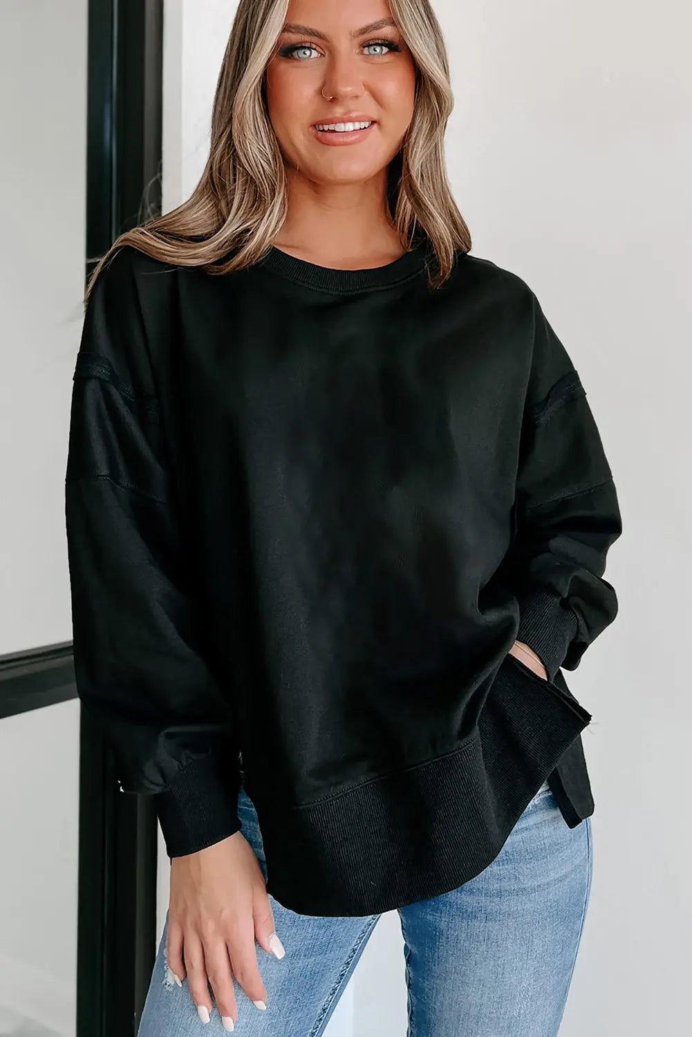 Black Exposed Seam Drop Shoulder Round Neck Sweatshirt with Slits - eAura