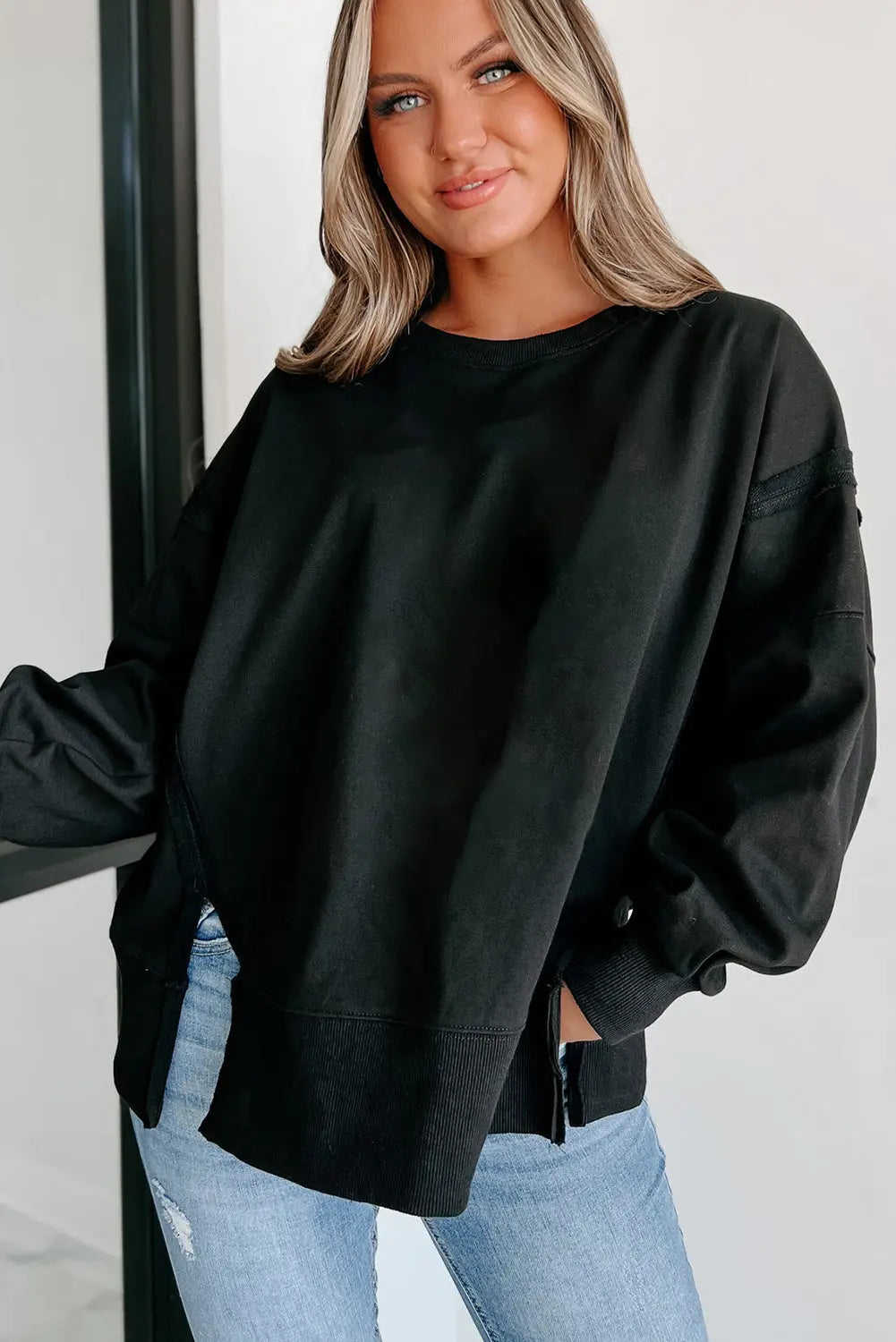 Black Exposed Seam Drop Shoulder Round Neck Sweatshirt with Slits - eAura