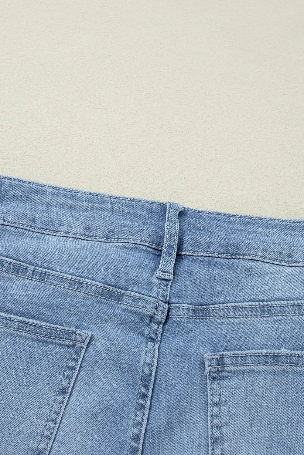 Dusk Blue High Rise Asymmetric Button Zip Fly Ripped Jeans eAura