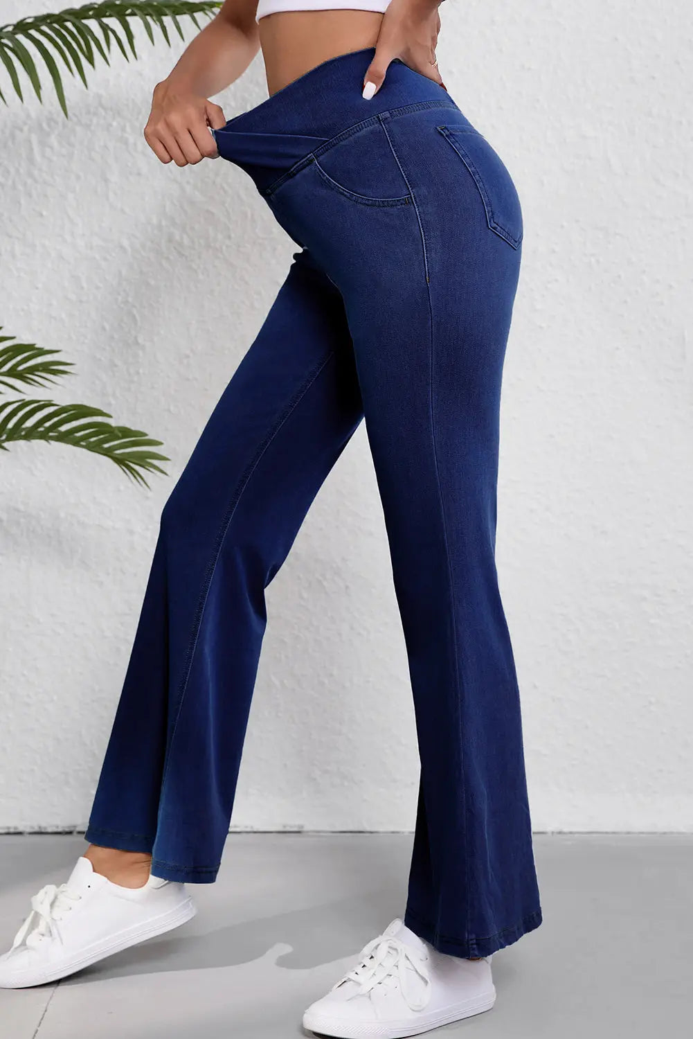 Dusk Blue Solid Crossed Waist High Elastic Fit Flare Jeans eAura