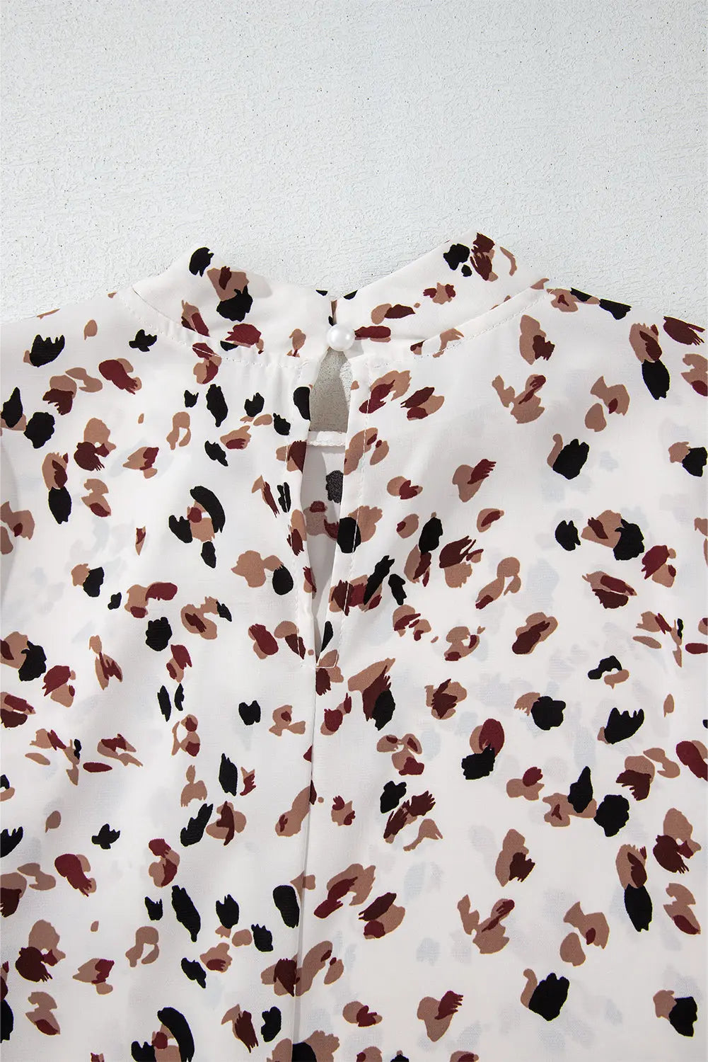 White Leopard Print Lantern Sleeve Mock Neck Pleated Blouse Beagle Boutique Fashion Outlet